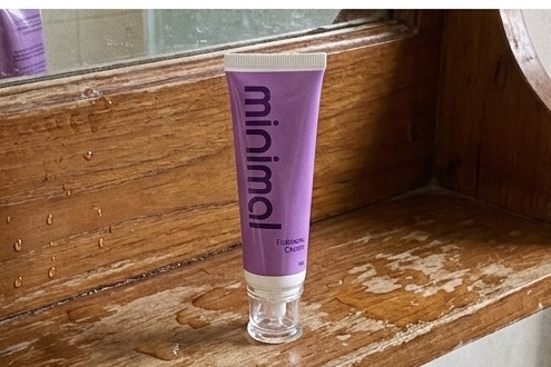 minimal Fairness Cream on a bathroom shelf
