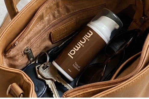minimal Tinted Sunblock in a handbag